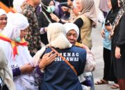 Tiba di Palembang, Kloter 17 Disambut Hujan Deras