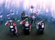 Gubernur Maluku Utara Sherly Tjoanda menyelam free diving dengan kostum ikan duyung membawa bendera Merah Putih