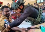 Satgas Pamtas Kewilayahan RI-PNG Yonif 763/SBA Laksanakan Yankes Gratis di SD Bamuswayman