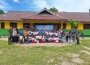 Satgas Yonif 123/Rajawali dan Dinas Perpustakaan Gelar Gerakan Literasi di SD Inpres Dagimon, Papua Selatan