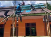 Jaga Kenyamanan Saat Beribadah, Satgas Yonif 763/SBA Bersama Masyarakat Laksanakan Karya Bhakti di Lingkungan Gereja