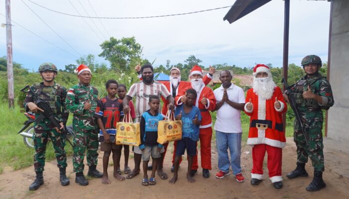 Satgas Yonif 123/Rajawali Tebar Kasih Natal hingga Pelosok Papua, Hias Kendaraan dan Bagikan 1.409 Paket Sembako