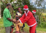 Pos Bulangkop Satgas Yonif 751/VJS Bagikan Bingkisan Natal di Kampung Bulangkop, Warga Sambut Penuh Sukacita