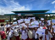 Warna-Warni Semangat Belajar: Pos Kotis Satgas Yonif 751/VJS Gelar Lomba Mewarnai Berhadiah Seragam Sekolah Baru