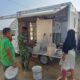 Kodim 0103/Aceh Utara Salurkan Air Bantuan Kemenko Polkam untuk Warga Huntara Kuala Keureuto