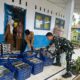 Personel Satgas TMMD Langkat Turun Langsung Bantu Penyaluran Makan Bergizi Gratis