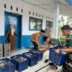 Satgas TMMD 128 Langkat,Ikut Bantu Menyalurkan MBG ke SMK Swasta Gebang