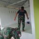 Tembok Hijau di Pasar Rawa: Saat Tentara dan Warga Patungan Membeli Rasa Aman