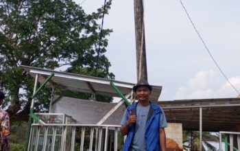 PEMASANGAN LAMPU JALAN UNTUK PENERANGAN MUSALA AL-WARTI