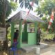 TNI dan Warga Talang Jambe Bersama Rapikan Pos Kamling, Fokus Kemanunggalan TNI dan Rakyat