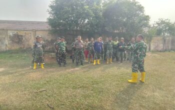Penutupan TMMD ke-129 Semakin Dekat, Personel Kodim 0418/Palembang Rapikan Lokasi Kegiatan