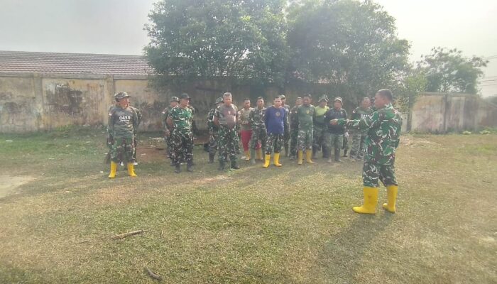Penutupan TMMD ke-129 Semakin Dekat, Personel Kodim 0418/Palembang Rapikan Lokasi Kegiatan