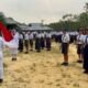 Kobarkan Semangat Nasionalisme di Perbatasan, Pos Jajaran SSK III Satgas Yonarmed 13/Nanggala Gelar Upacara Kemerdekaan Bersama Siswa
